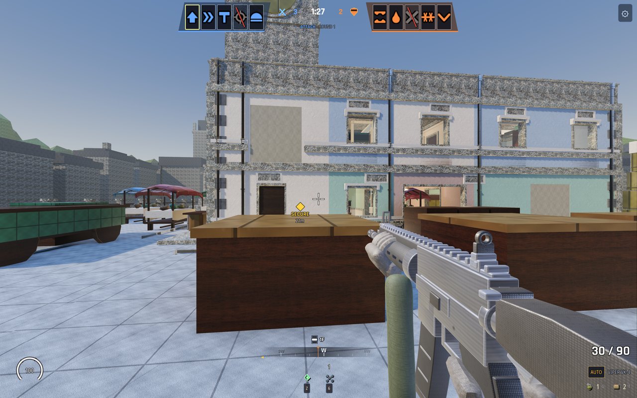 First-person view across the market square toward the market house, with the multiplayer HUD: both five-man team rosters and the round clock along the top, a SECURE objective marker reading 21 metres, and ammunition, compass and floor indicator along the bottom